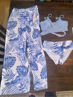 3 piece swim set. Bikini and sheer pant coverup. Youth size 11-12. NWT